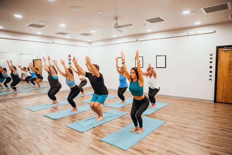 Lotus Hot Yoga studio and class photo