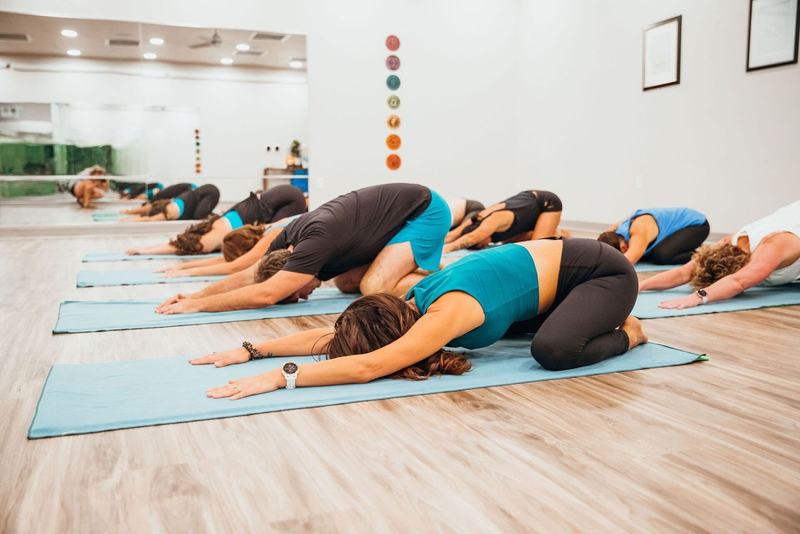 Lotus Hot Yoga studio and class photo