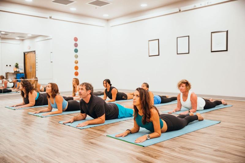 Lotus Hot Yoga studio and class photo