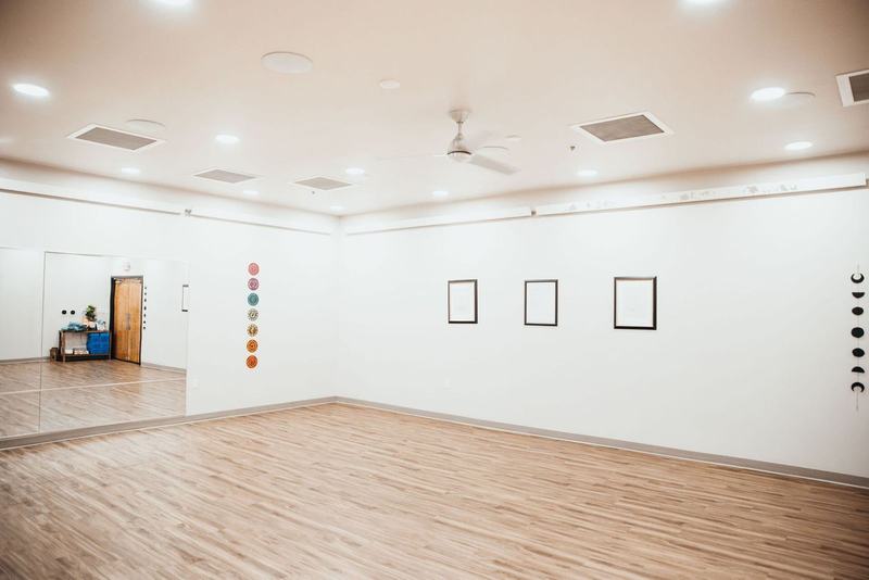 Lotus Hot Yoga studio and class photo